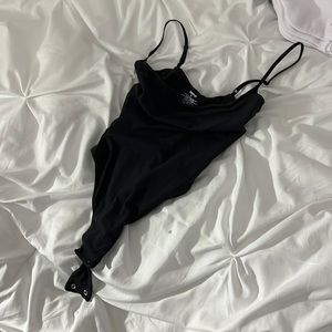 Skims body suit thong